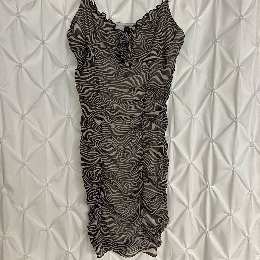 Body con ruffled, brown, and cream colored dress.